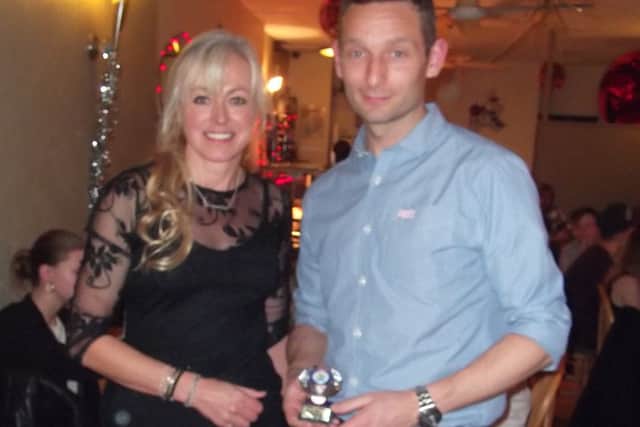Janine Stones with Outstanding Performance winner Rob Hawse EMN-170901-130729002