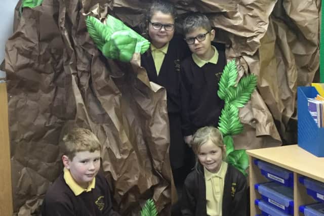 Skegness Richmond School Year 4 pupils and  the cave constructed in Mr Nick Voces classroom. ANL-170901-160403001