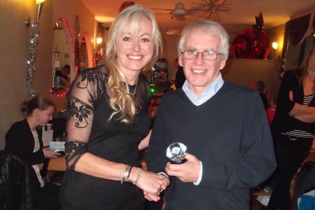 Janine Stones with Kev Harrison who claimed the Best Veteran Male Performance award EMN-170901-162331002