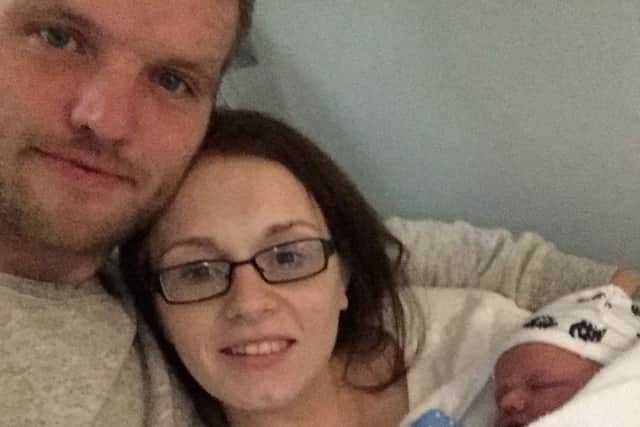 Jamie Winnard with Charlene Brighton and their child Carter J Stephen Winnard. EMN-171201-173125001