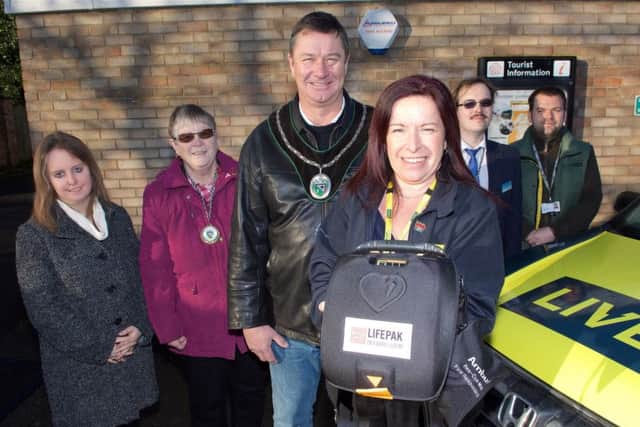Market Rasen Festival Hall now has a defibrillator for public use.Pictured are, from left, Faye Lambkin-Smith (Town Clerk), Margaret Lakin-Whitworth (town councillor), Mayor John Matthews, Kirsty Heywood (Lives), Coun Thomas Smith and Grant White EMN-170123-064816001