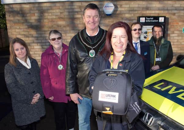 Market Rasen Festival Hall now has a defibrillator for public use.Pictured are, from left, Faye Lambkin-Smith (Town Clerk), Margaret Lakin-Whitworth (town councillor), Mayor John Matthews, Kirsty Heywood (Lives), Coun Thomas Smith and Grant White EMN-170123-064816001