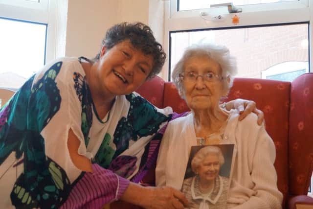 Centenarian Nancie Stonehouse and her daughter Linda EMN-170122-192531001