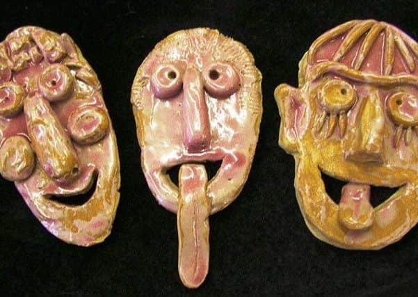 Children can make funky faces at pottery session. EMN-170120-111340001