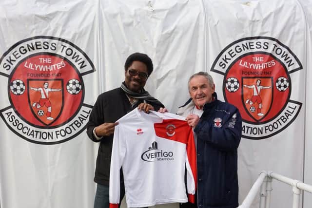 The Lilywhites kit is presented to Dr Bola Taiwo (left) by Skegness Town club secretary Allan Gray.