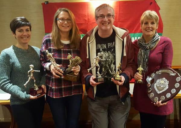 Sleaford Town Runners awards winners, from left - Ana Hendrickson, Jayne MacArthur, Alistair Whitaker and Angie Freemantle. 3vvV1VhuS8odZdypQS76