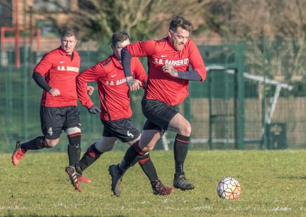 Coningsby Reserves charge into action during Saturday's match with Kirton Town Reserves. Photo: Colin Smedley/Oscarpix Imaging