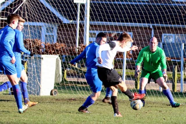 Kyle McGuigan scores his first.