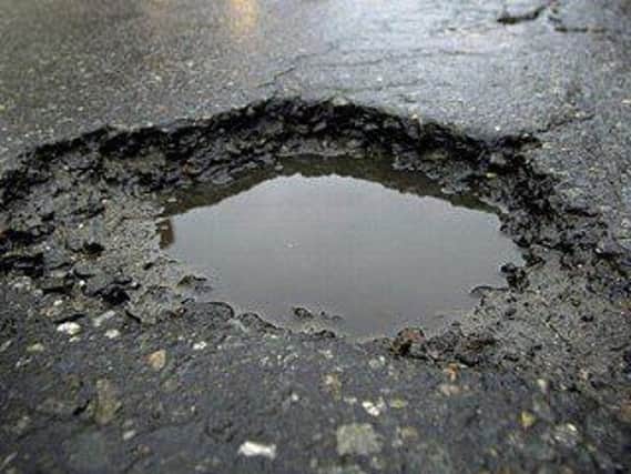 A Â£2.5 million pothole fund will benefit local road-users. ANL-170116-142443001