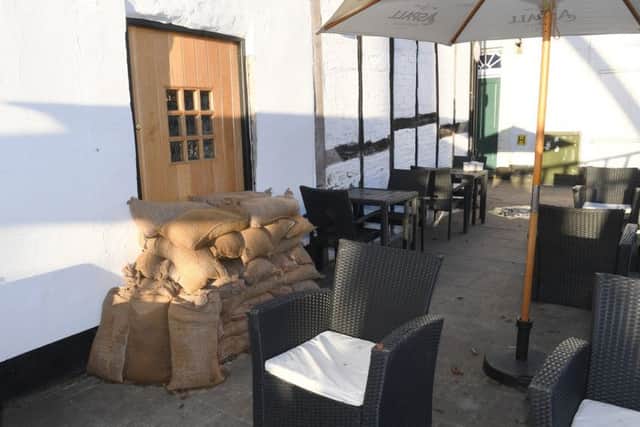 Flood defences at Church Keys wine bar and restaurant.