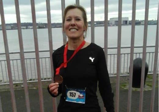 Paula Downing is bidding to join the 100-marathon club EMN-170116-172650002