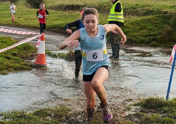 Ellie Rainbow in action at the Lincolnshire Cross Country Championships EMN-170116-130758002