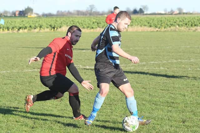 Toni Pascu and Carl Wilson in action as Leverton beat Coningsby.
