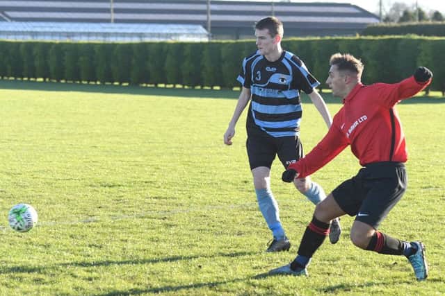 Leverton v Coningsby action sees Jordan Cobb batle with Jamie Congelton.