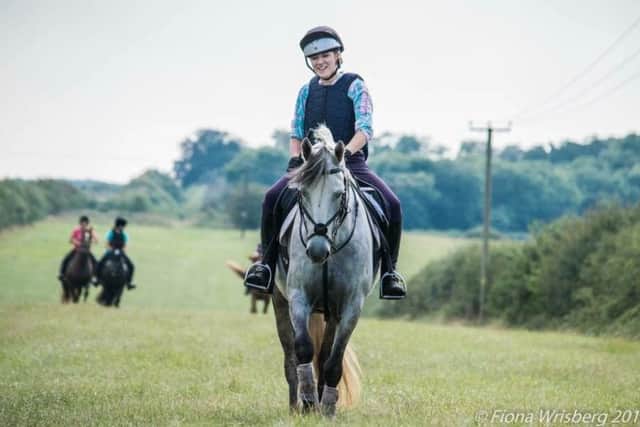 Sian Lovatt riding Ziggy before the scare when a lorry passed too close on a road in Hundleby. ANL-170117-112552001