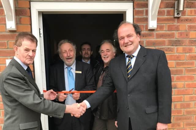 At the official opening of new tenant Vince King's flat on Welchman Way, Heckington with (from left) - Deputy Leader of NKDC Coun Mike Gallagher, Coun Stewart Ogden - NKDC Executive Board Member for Housing, Phil Roberts - NKDC Corporate Director, Vince King and David Chambers - chairman of constructors Lindum Group. EMN-170117-141121001