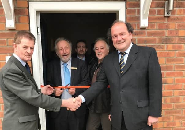 At the official opening of new tenant Vince King's flat on Welchman Way, Heckington with (from left) - Deputy Leader of NKDC Coun Mike Gallagher, Coun Stewart Ogden - NKDC Executive Board Member for Housing, Phil Roberts - NKDC Corporate Director, Vince King and David Chambers - chairman of constructors Lindum Group. EMN-170117-141121001