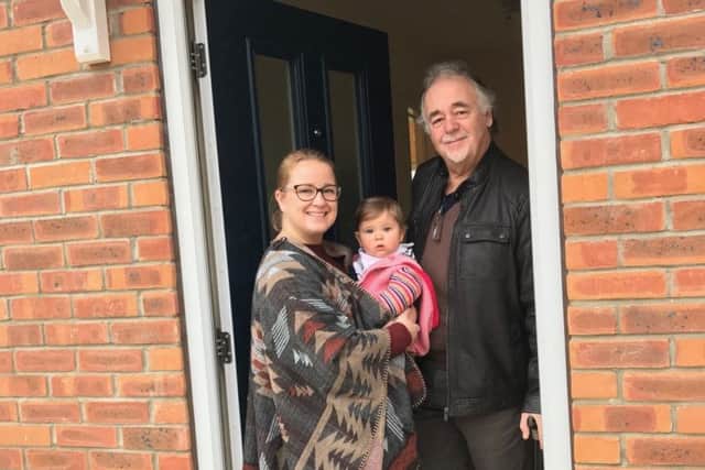 A new home for first tenant Vince King at Welchman Way, Heckington, pictured with daughter Claire Loose and granddaughter Ivy Loose. EMN-170117-141132001