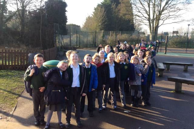Pupils smiling during their 1kaday walk yesterday (Tuesday). EMN-170124-122504001