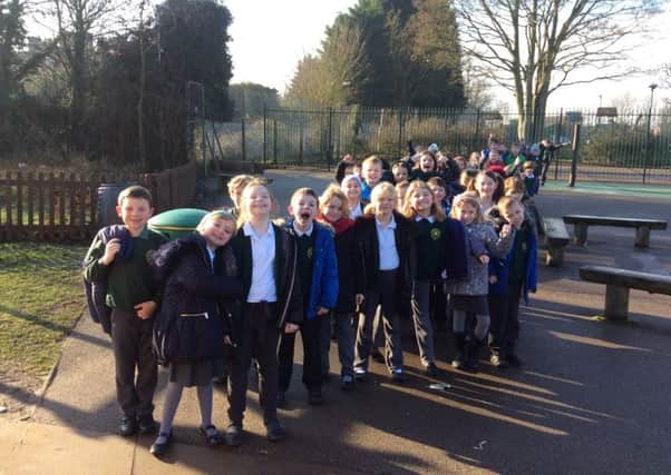 Pupils smiling during their 1kaday walk yesterday (Tuesday). EMN-170124-122504001