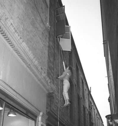 Trialling emergency fire equipment at the Electricity Boards offices, in Market Place, Boston. EMN-170118-153704001