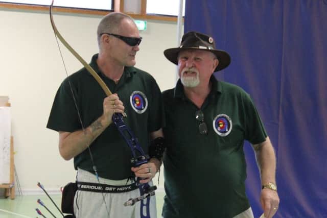 Stuart with his spotter Rick Smith, chairman of Louth and District Archers EMN-170119-115843002