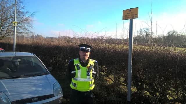 On patrol: PCSO Nigel Wass in Bowl Alley Lane which is at the centre of claims about unfair parking regulations.