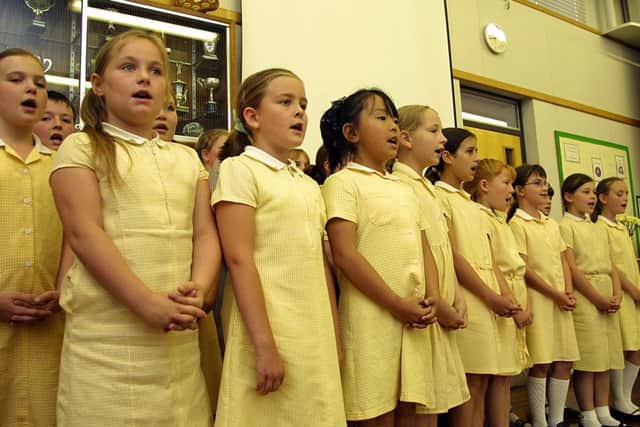 Pupils performing at the opening of an extension at Richmond School in June 2004.