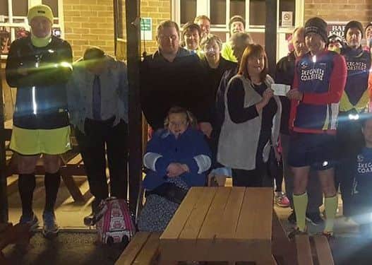 Members of the Skegness Coasters presented a Â£2,000 cheque to Alive and Kicking. e-EsIpY4UnycSF3xYXdX