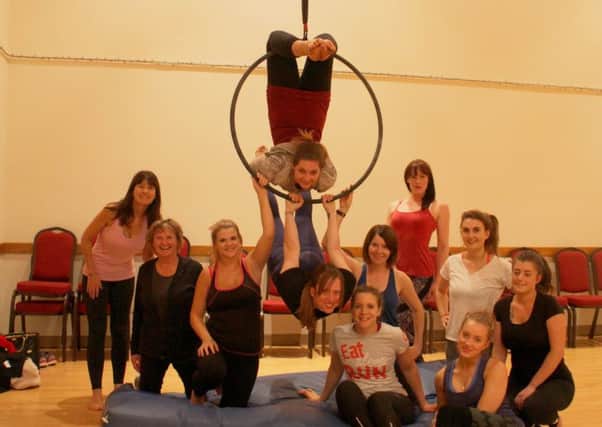 Aerial dance fitness classes are taking place in Boston. EMN-170123-153719001