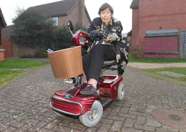 Mrs Jean Sleath of Heckington, pictured on her mobility scooter. EMN-170124-104044001