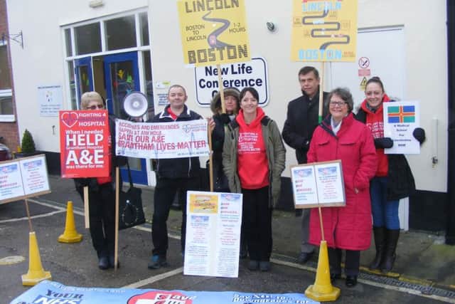 Protestors from Fighting for Grantham Hospital and SOS Pilgrim Hospital outside the meeting in Sleaford today (Wednesday) with chairman of the county  Health Scrutiny Committee, Coun Christine Talbot who attended the meeting (2nd from right). From left Bernice Cullimore, Ian Brothwell, Alison Marriott, Sarah Stock, Phillip Bosworth and Melissa Darcy. EMN-170125-104823001