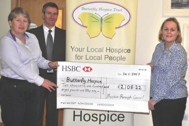 Coun Claire Rylott and Martin Potts present a cheque to Linda Sanderson, Butterfly Hospice Trust manager. Photo supplied.
