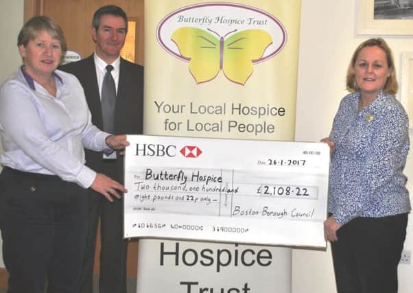 Coun Claire Rylott and Martin Potts present a cheque to Linda Sanderson, Butterfly Hospice Trust manager. Photo supplied.