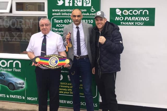 Callum Johnson has received sponsorship from Bostons Acorn Taxis. Ive done well from Boston, and we like to give something back to the town, particularly to good sportspeople, said company owner Zhahed Younis, who is pictured with Johnson  and employee David Armstrong. The firm will sponsor Johnsons kit in  his upcoming Glasgow bout.