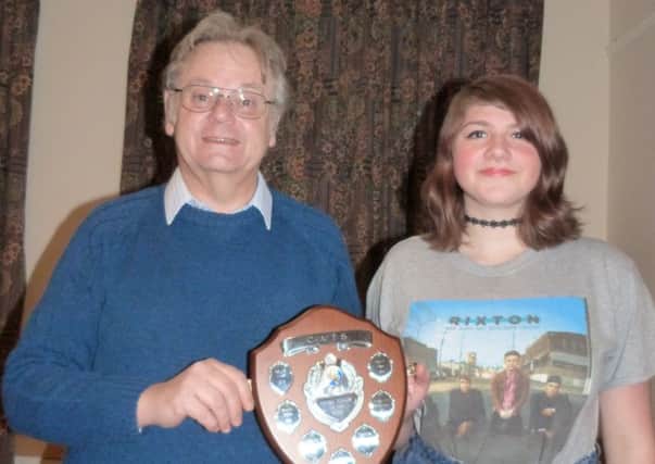 Hollie Vines was named Young CATS Person of the Year and received her award from chairman Mike Cluff (photo by Linda oxley). EMN-170202-142629001