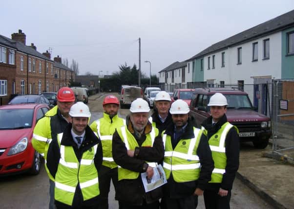 NKDC executive board member Stewart Ogden (centre) and the team leading the redevelopment of the Newfield Road council housing complex. EMN-170130-182334001