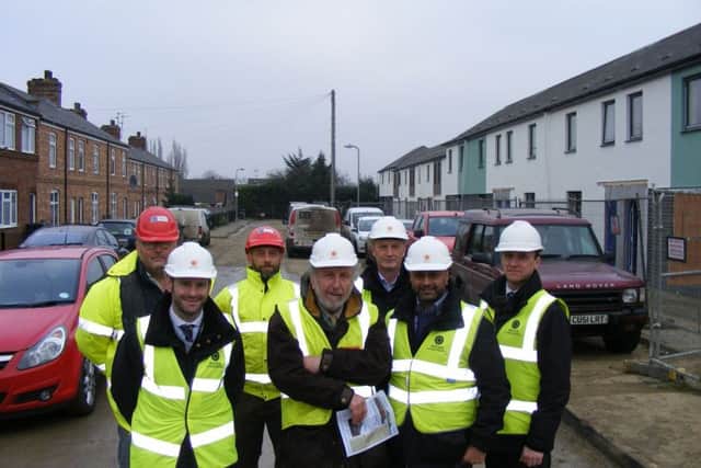 NKDC executive board member Stewart Ogden (centre) and the team leading the redevelopment of the Newfield Road council housing complex. EMN-170130-182334001