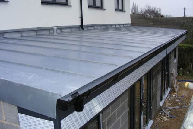 A zinc roof on top of the new rear extension of some of the properties on Newfield Road. EMN-170130-182306001