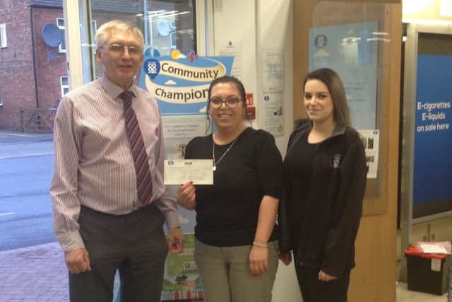 Boston Indoor Bowling Club where chosen to be Community Champions last year for 12 weeks by Lincolnshire Co-Op. This means that the club has received a cash boost of £710.12 thanks to money spent in store by customers and divident card holders. Richard White and Tanya Whitmore-Brown are pictured with customer liaison representative Becki Clayton (right) from Lincolnshire Co-op, presentatiing them with the money at the Argyle Street store. The money will go towards a wheelchair which will be used on the bowling green for disabled members and visitotrs.