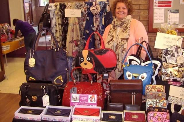 Gill Allenby on her stall. EMN-170131-115149001