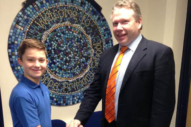 Finn Beckett with MP Lincoln MP Karl McCartney. EMN-170602-155002001