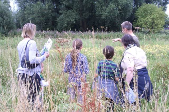 A family exploring Lollylocks Field Nature Reserve. EMN-170602-102238001