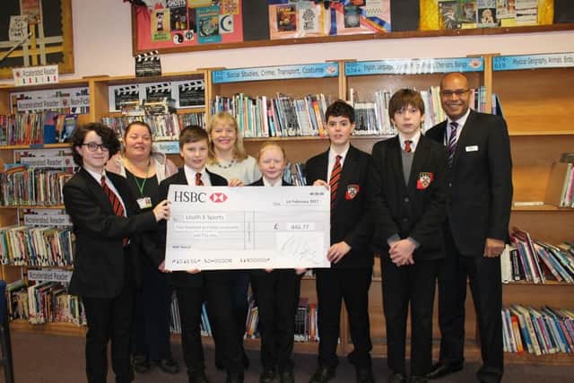Cordeaux Academy Principal Patrick Daley with students and members of the Louth X Sports committee.