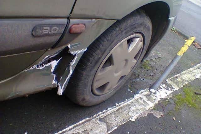 The damage caused to Mr Fosters car by the pipe (pictured).