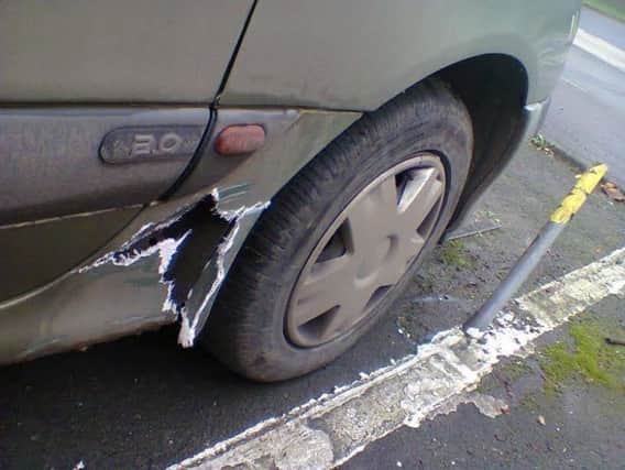 The damage caused to Mr Fosters car by the pipe (pictured).