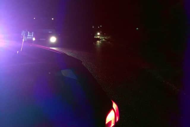 Police at the scene on the A52