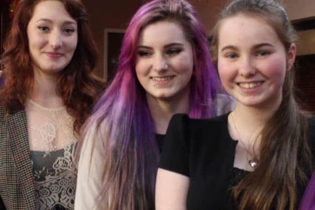 Thirteen-year-old Amy Gilpin (right) alongside her sisters Megan and Lindsey.
