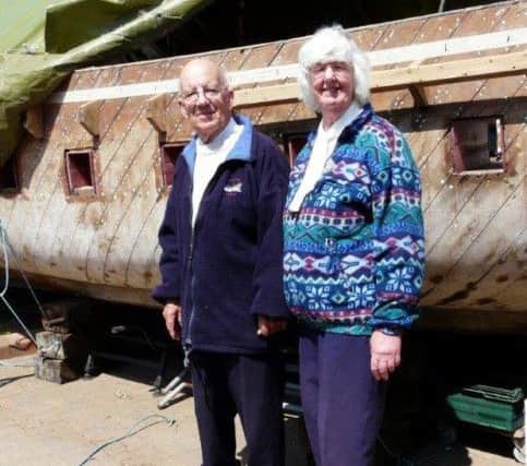 Joel and April Grunnill next to the Anne Allen as it was being restored.