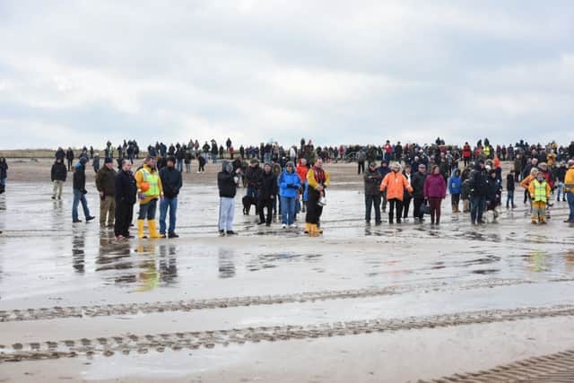 Crowds on Skegness beach watching the arrival of the new lifeboat. Photo: MSKP-280117-14 ANL-170130-112705001